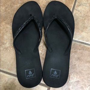 Reef black flip flops